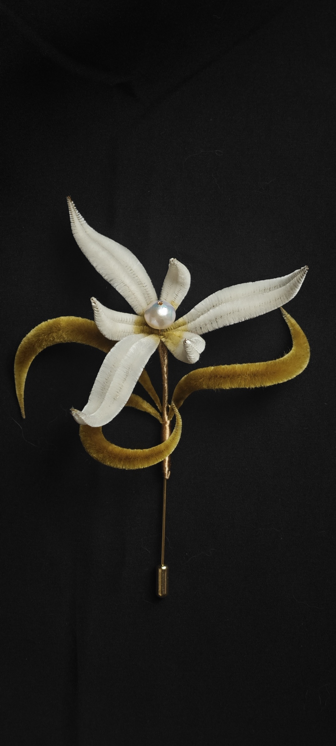White and gold silk flower brooch by Xiaye Bloom